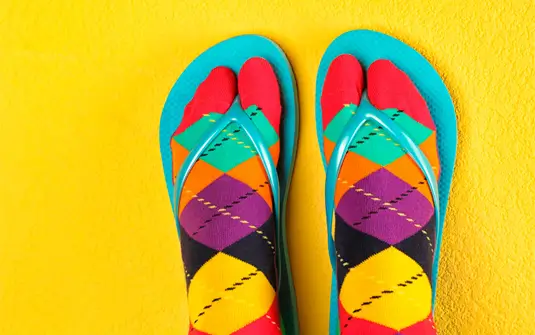 Colourful socks in blue sandals