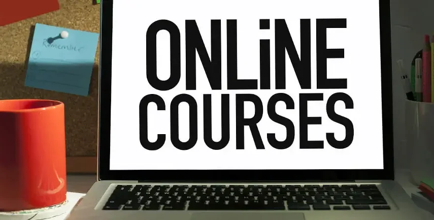 Online course on laptop screen for bespoke website development