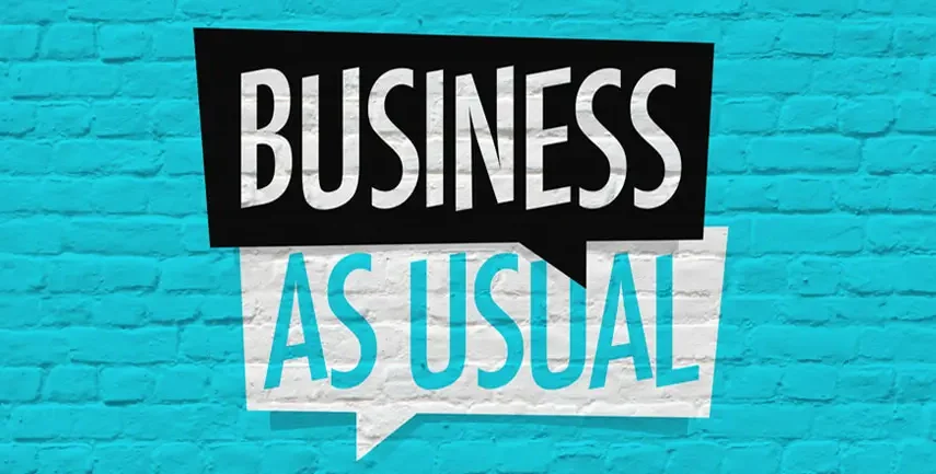 Business as usual graphic on blue wall for digital design