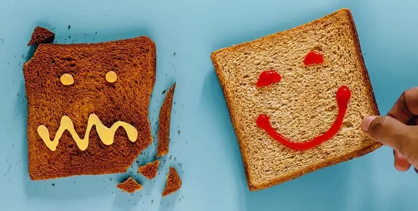 Happy and sad toast digital graphic design for website copywriting services